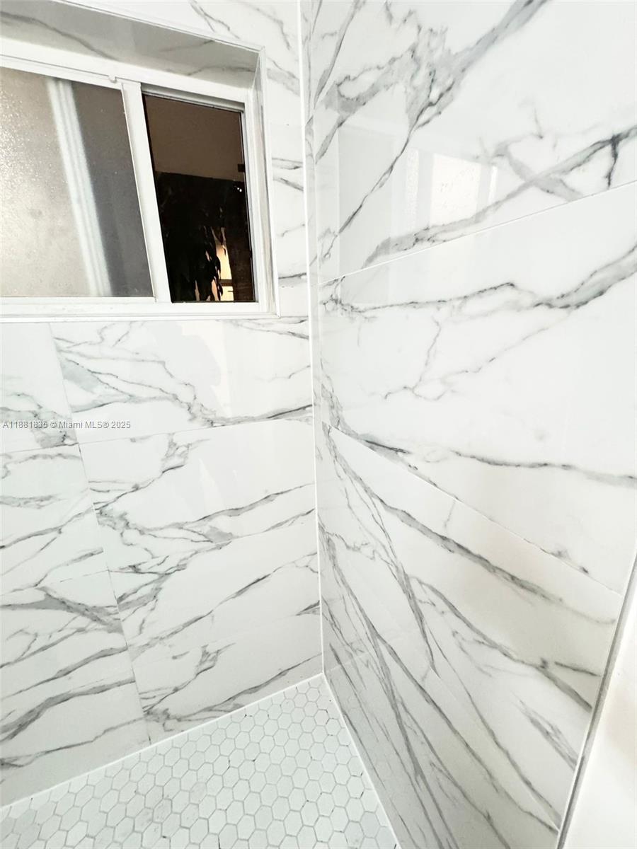 7435 Byron Avenue, Unit 2 Miami Beach, FL 33141 - Photo 24 of 35 a view of wooden floor