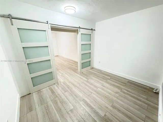 a view of an empty walk in closet