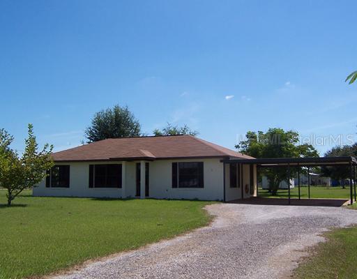 417 Jerry Smith Road Plant City, FL 33567 - Photo 1 of 1 a front view of a house with a yard
