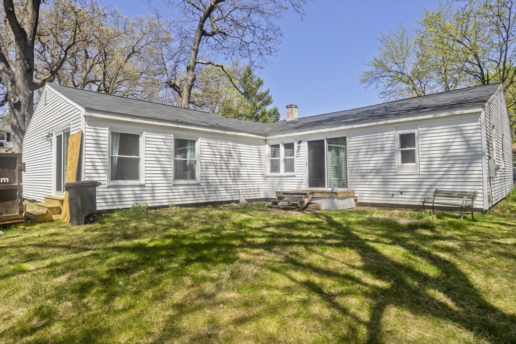 138 Stapleton Road Springfield, MA 01109 - Photo 36 of 38 a front view of a house with a garden