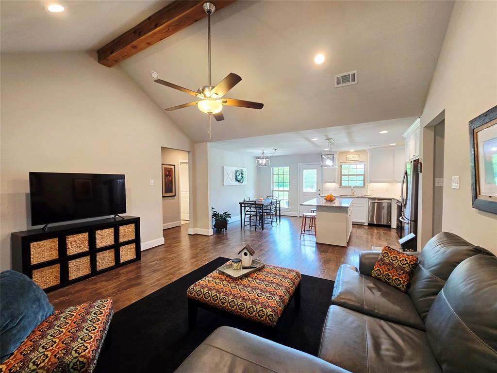 101 East Whitewright Road Savoy, TX 75479 - Photo 6 of 19 Vaulted and beam accent