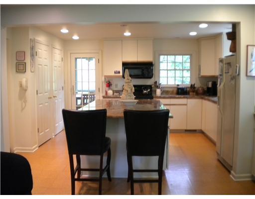 37 Easton Road Fox Chapel, PA 15238 - Photo 5 of 9 Kitchen. Large kitchen features granite counters, cork flooring, double pantry, dry bar, recessed lighting and access to the screened porch and deck. All appliances included.