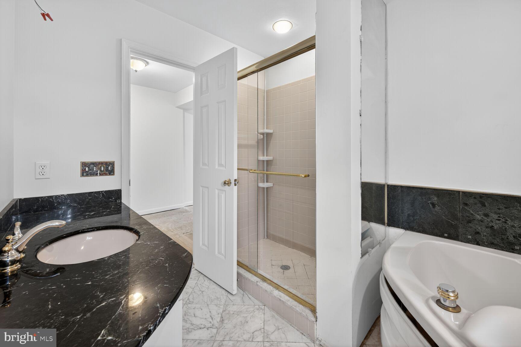 3625 Jenifer Street Northwest Washington, DC 20015 - Photo 14 of 30 Elegant bathroom with modern fixtures.
