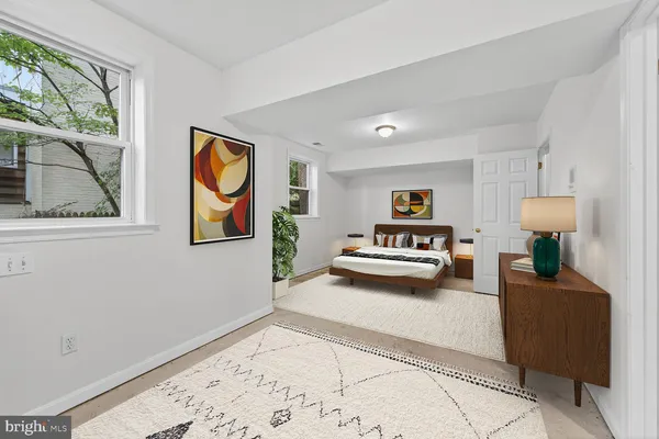 a view of living room with furniture and a window