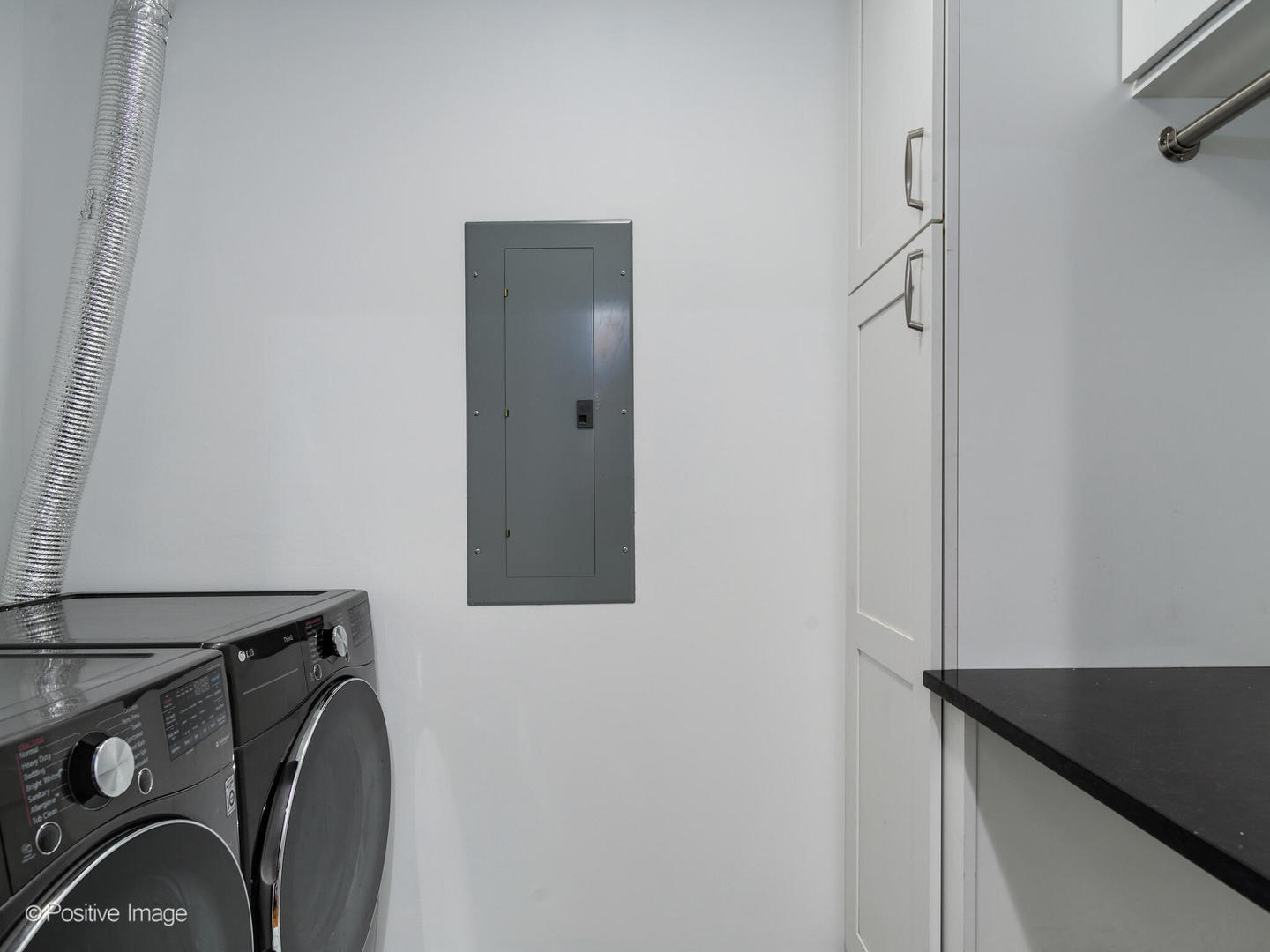 657 West Fulton Street, Unit 708 Chicago, IL 60661 - Photo 22 of 22 a bathroom with a sink and a mirror