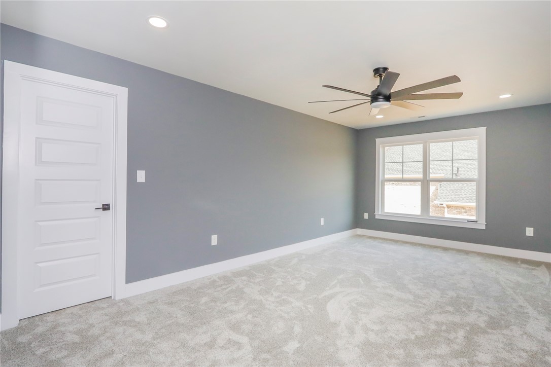 2403 Warriors Path Anderson, SC 29621 - Photo 31 of 50 This spacious bedroom offers ample natural light and a serene atmosphere, perfect for comfortable living.