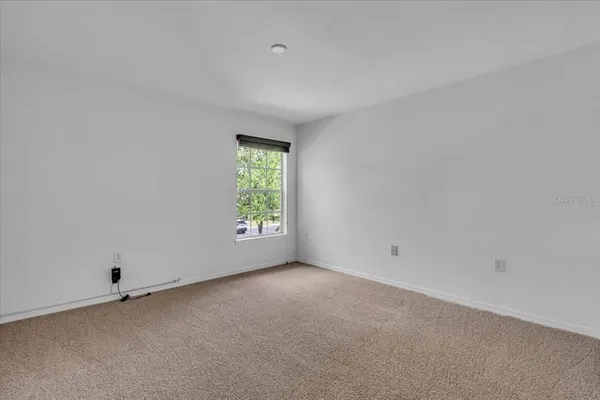 an empty room with a window