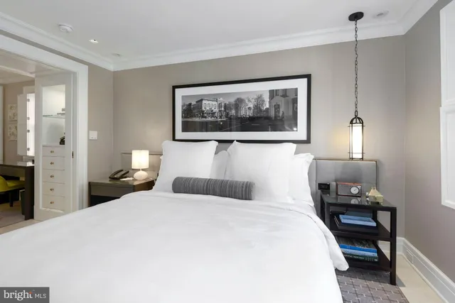 a dining room with a table and chairs