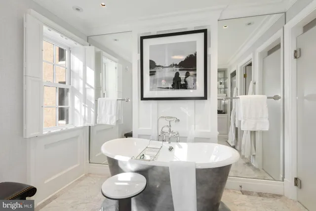 a bathroom with a sink a toilet and a bathtub