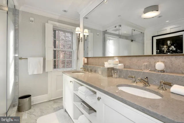 a living room with furniture a rug and a fireplace