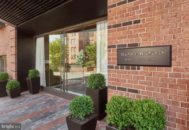 a room with lots of chairs and a projector screen