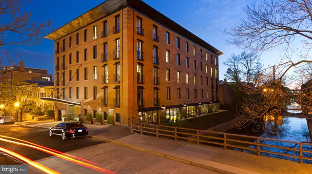a large room with lots of furniture and rug