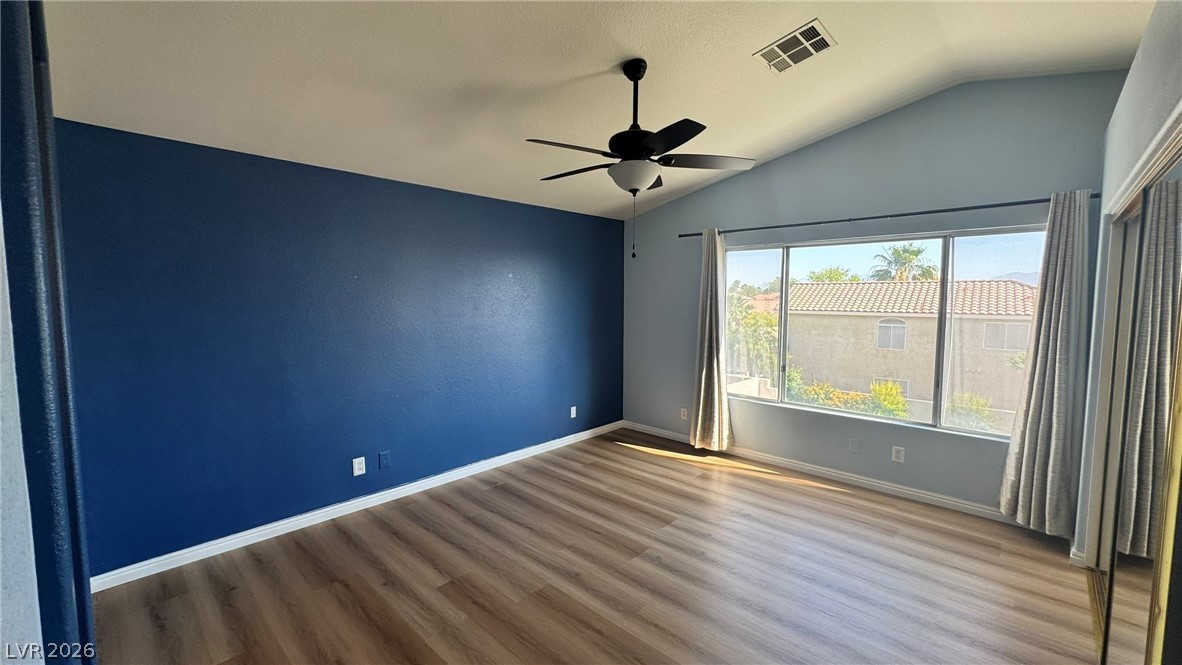 9716 Ridge Creek Place Las Vegas, NV 89134 - Photo 20 of 28 This spacious bedroom offers abundant natural light and an expansive layout for comfortable living.