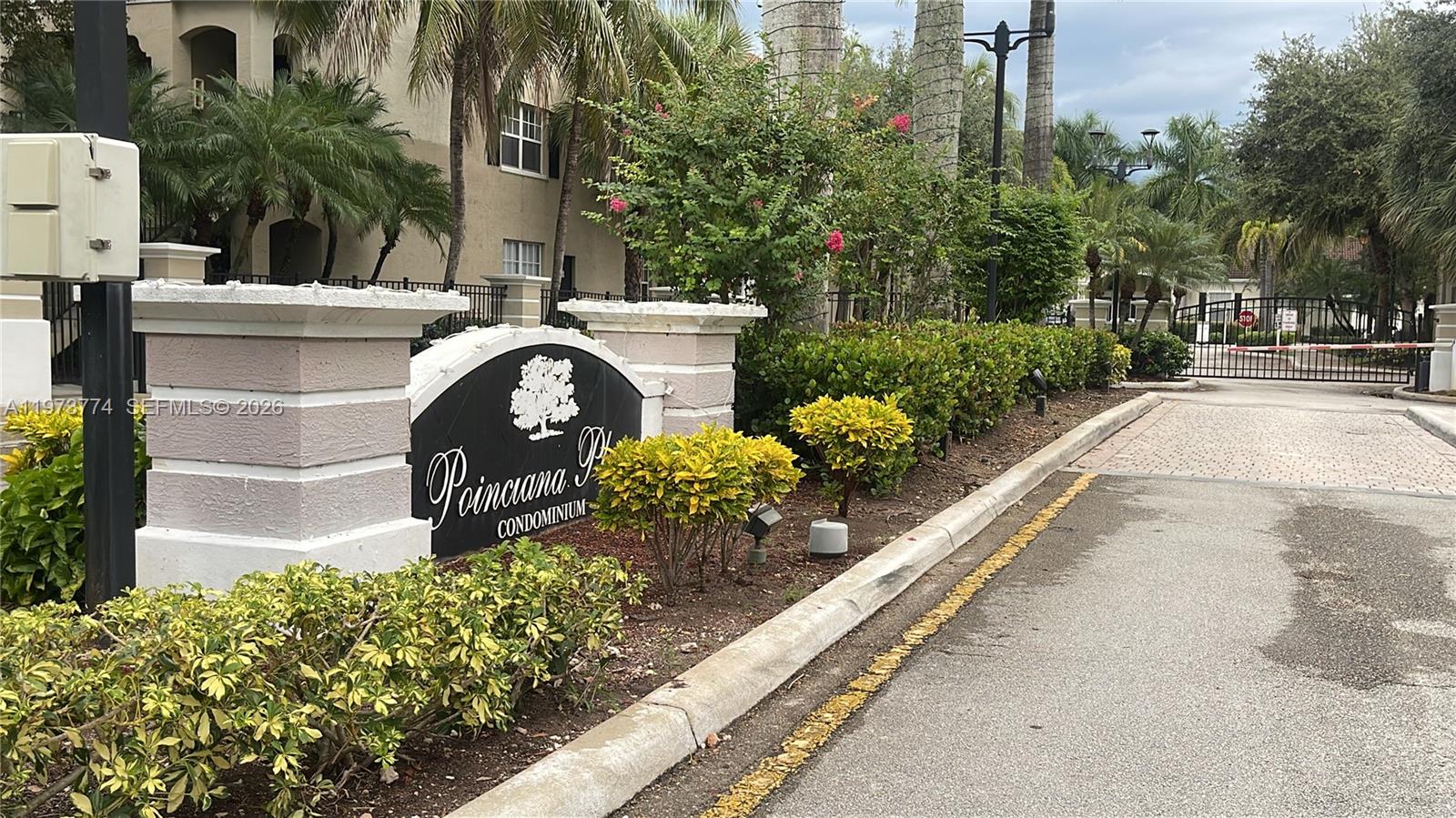 6020 West Sample Road, Unit 207 Coral Springs, FL 33067 - Photo 2 of 17 a view of a garden with flowers