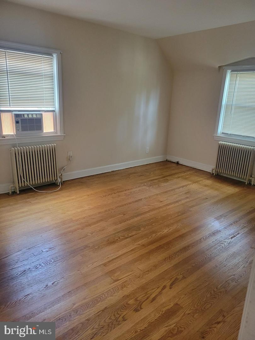 8404 Cedar Street Silver Spring, MD 20910 - Photo 8 of 18 Bright and airy space with hardwood floors.
