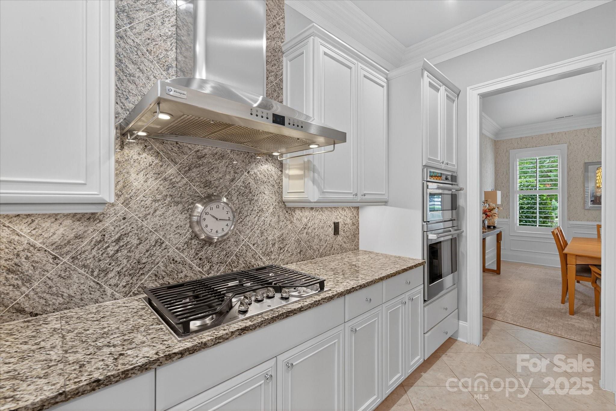 9614 Wheatfield Road Charlotte, NC 28277 - Photo 13 of 47 a kitchen with sink stove and cabinets