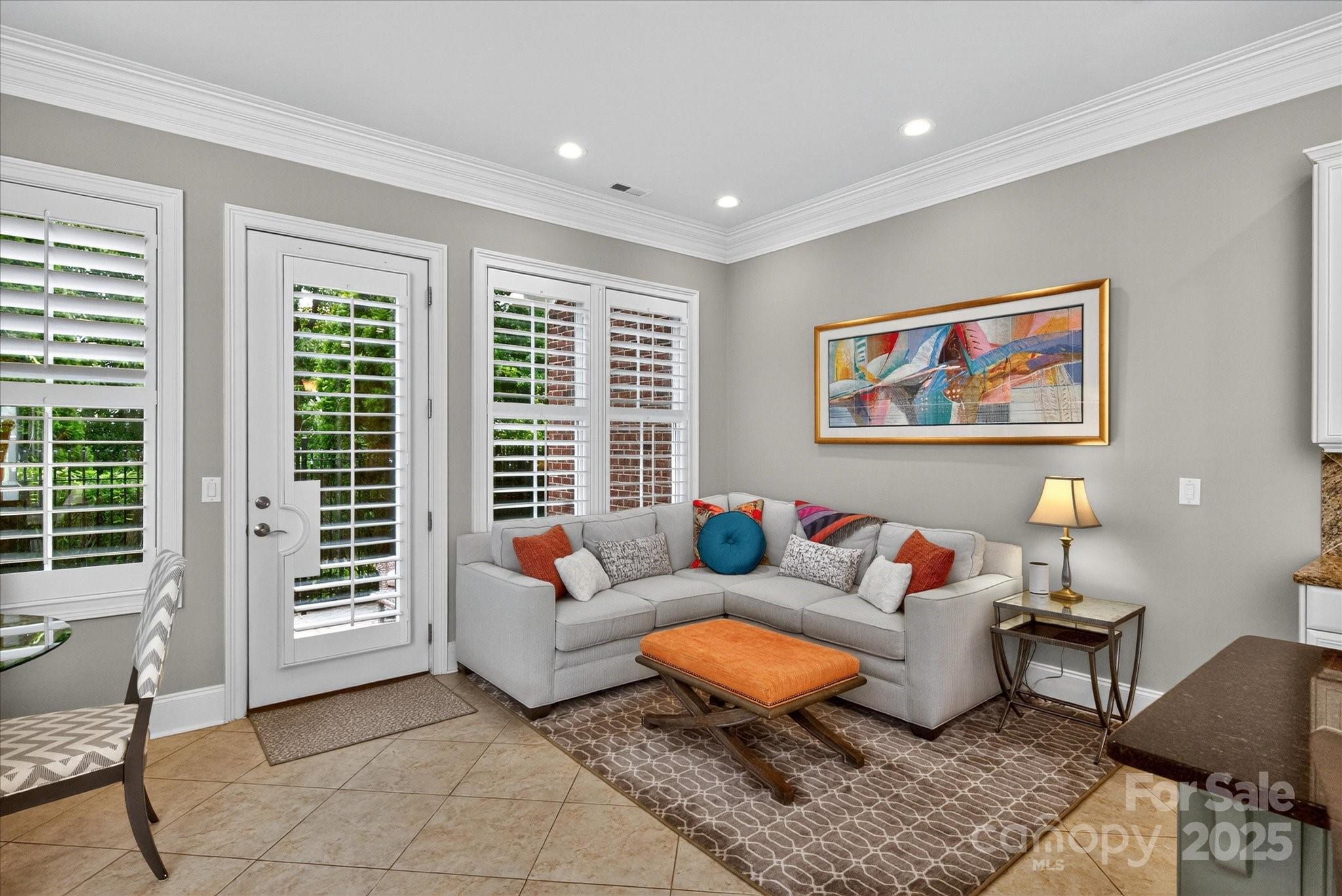 9614 Wheatfield Road Charlotte, NC 28277 - Photo 18 of 47 a living room with furniture a rug and a window