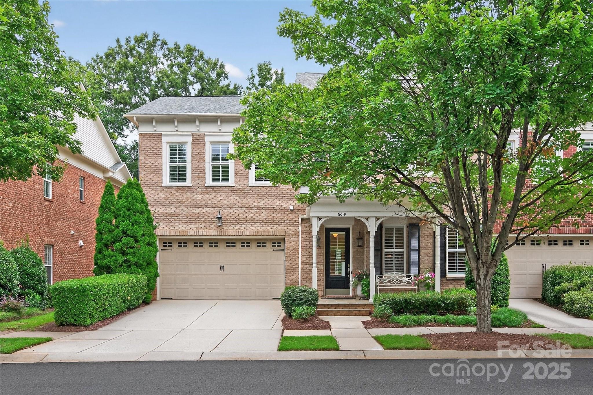 9614 Wheatfield Road Charlotte, NC 28277 - Photo 2 of 47 a front view of a house with garden