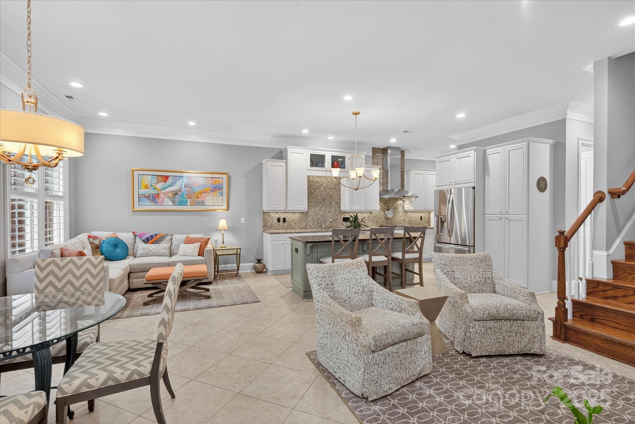 9614 Wheatfield Road Charlotte, NC 28277 - Photo 21 of 47 a living room with furniture and a large window