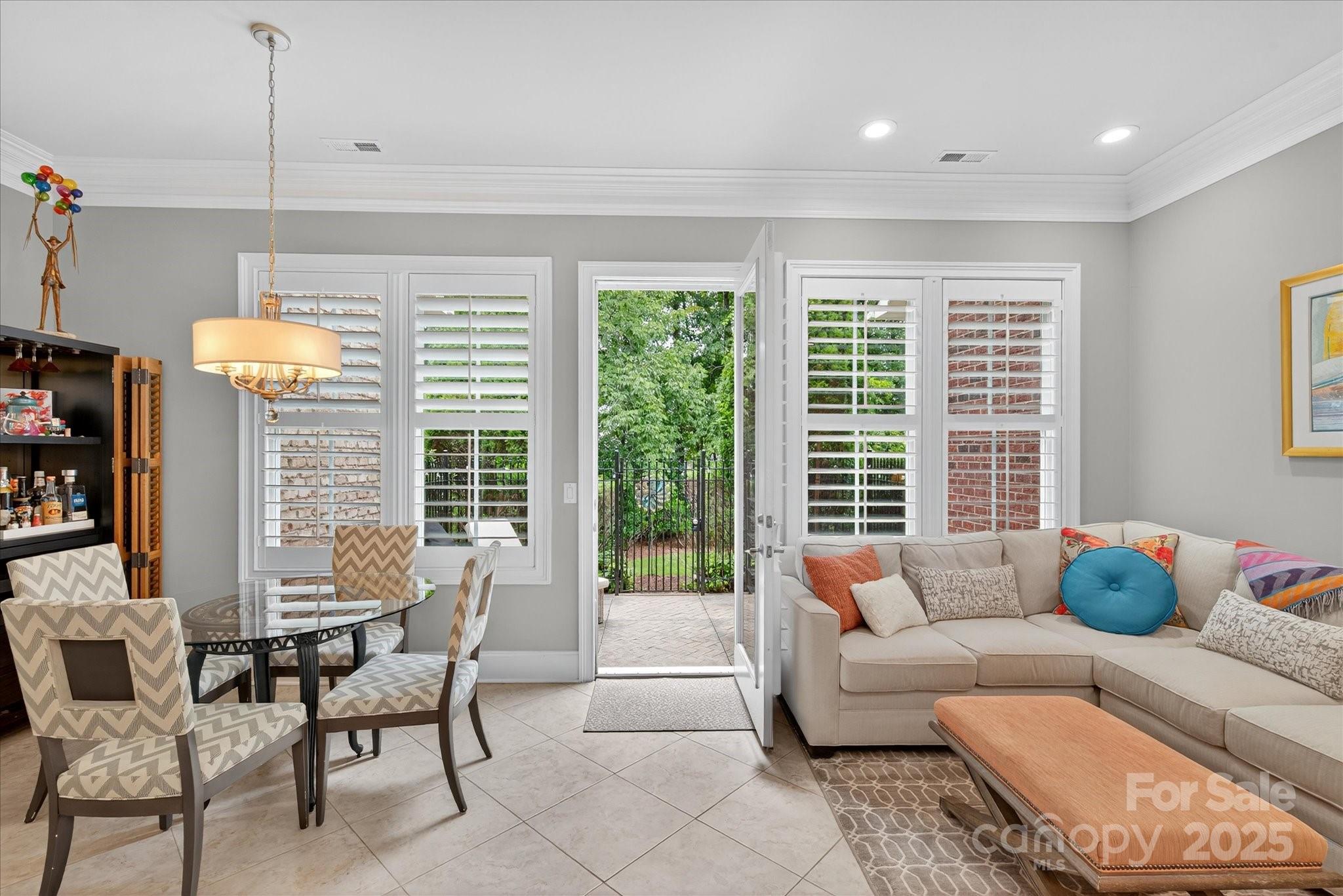 9614 Wheatfield Road Charlotte, NC 28277 - Photo 22 of 47 a living room with furniture and a large window