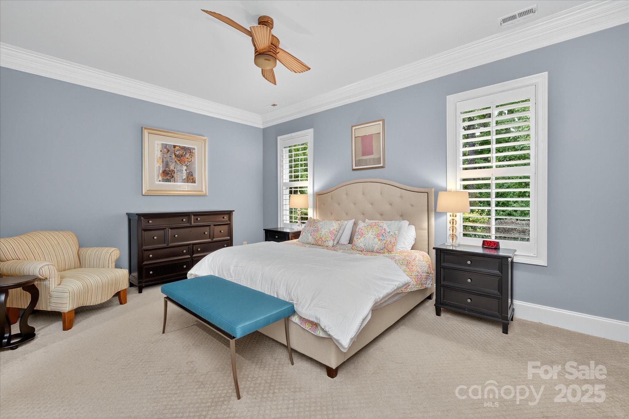 9614 Wheatfield Road Charlotte, NC 28277 - Photo 23 of 47 a bedroom with a bed a couch and a window
