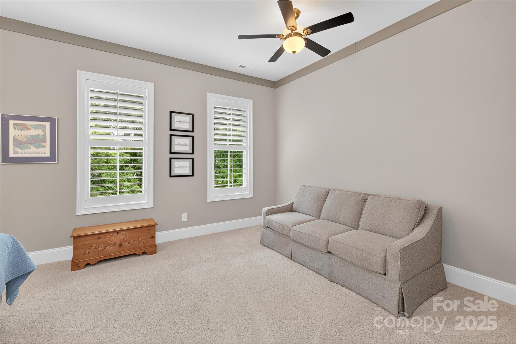 9614 Wheatfield Road Charlotte, NC 28277 - Photo 35 of 47 a living room with furniture and a window