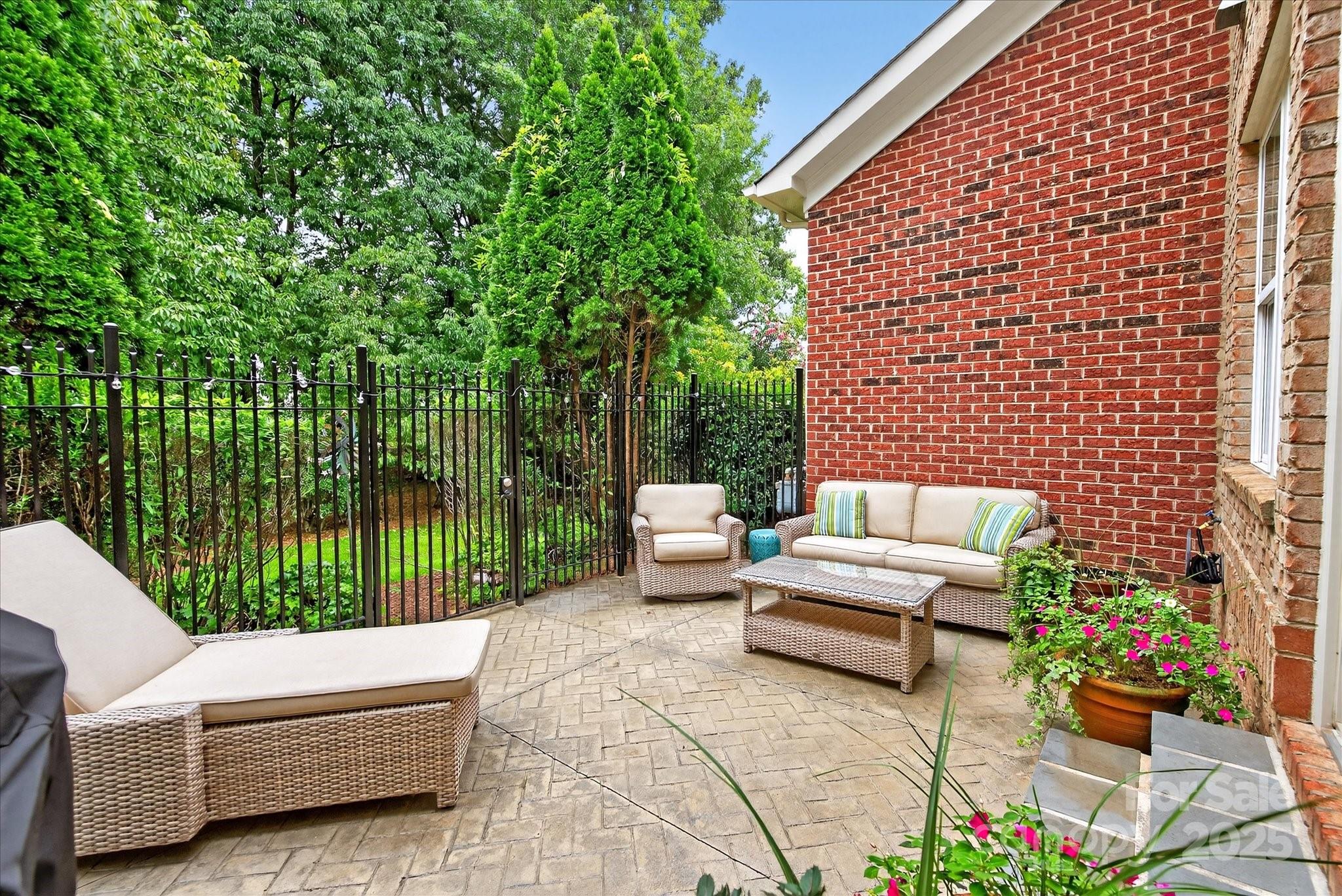 9614 Wheatfield Road Charlotte, NC 28277 - Photo 4 of 47 a outdoor living space with furniture and garden view