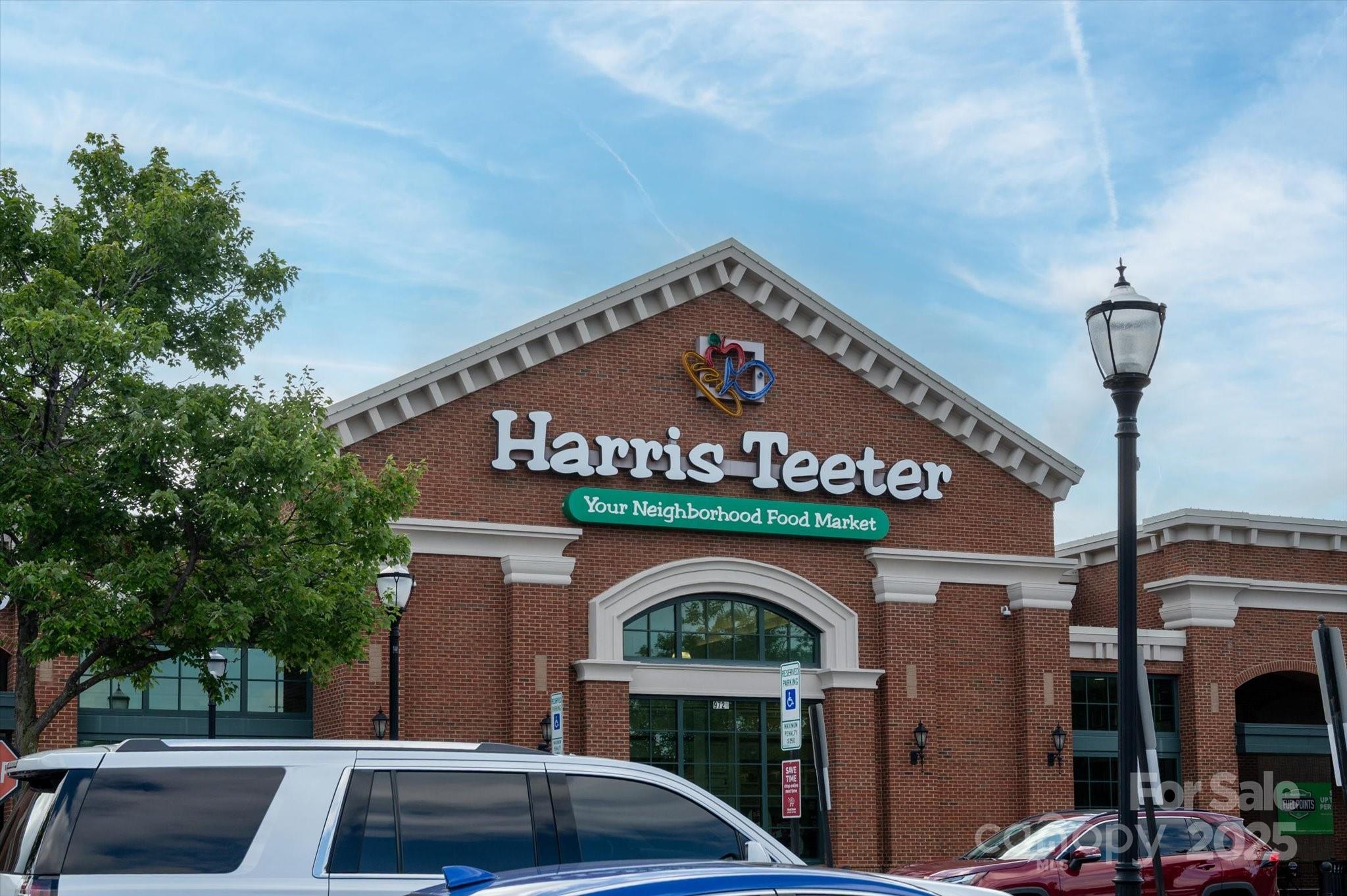 9614 Wheatfield Road Charlotte, NC 28277 - Photo 47 of 47 a front view of a building with parking