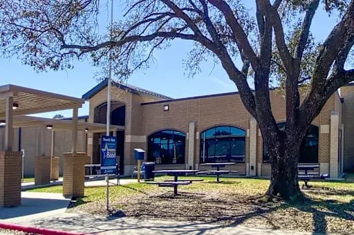 3315 Candleridge Drive Spring, TX 77388 - Photo 16 of 25 Nestled beneath a sprawling tree, Haude Elementary School offers a charming and welcoming environment perfect for fostering young minds.