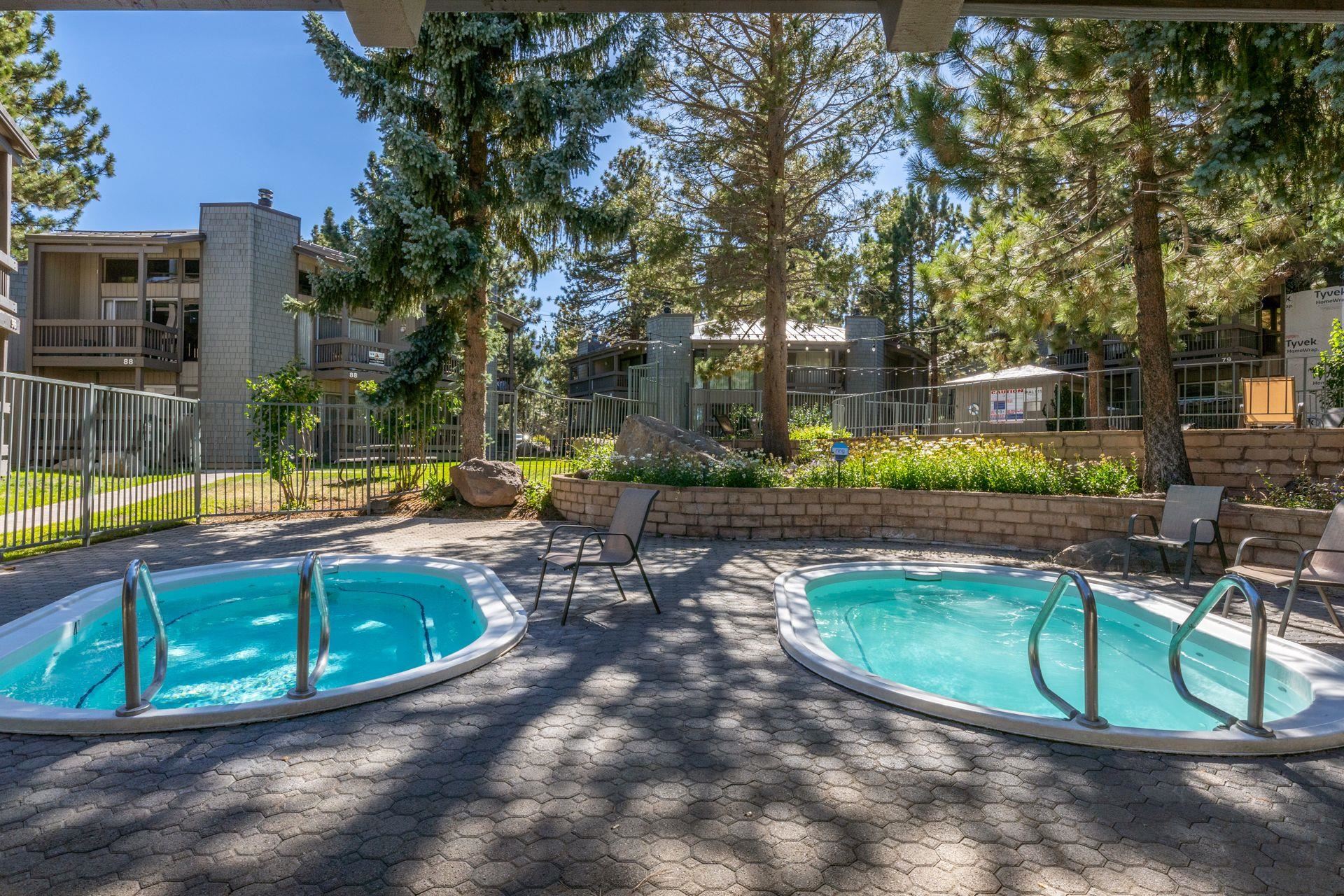 286 Old Mammoth Road, Unit 71 Mammoth Lakes, CA 93546 - Photo 24 of 24 View of swimming pool with a community hot tub, patio surround, and a swimming pool