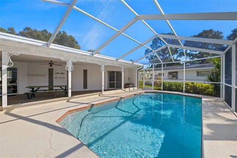 a view of a house with a swimming pool