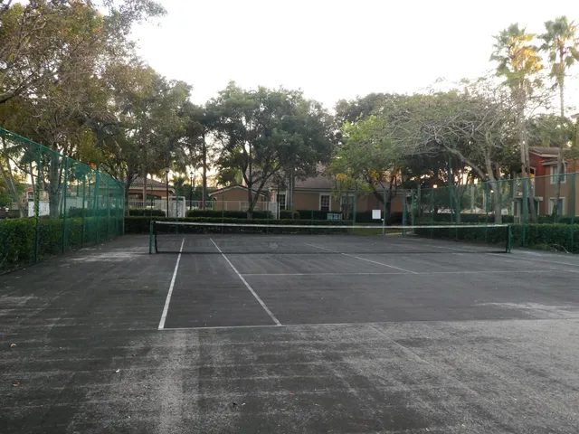 a view of backyard with green space