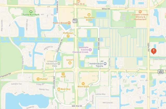 a bathroom with a sink and a shower curtain