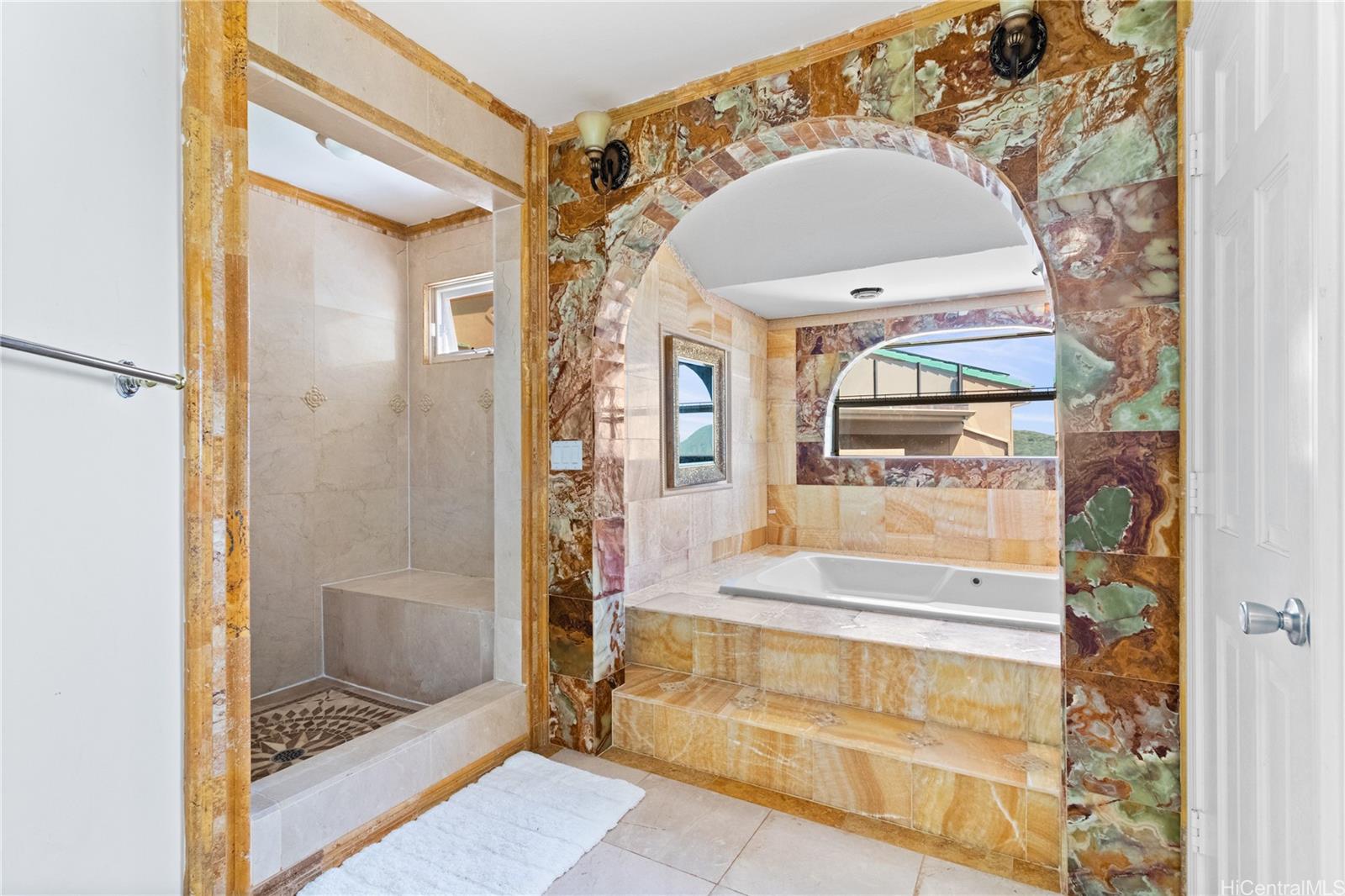 483 Maono Loop Honolulu, HI 96821 - Photo 12 of 25 a bathroom with a tub and shower
