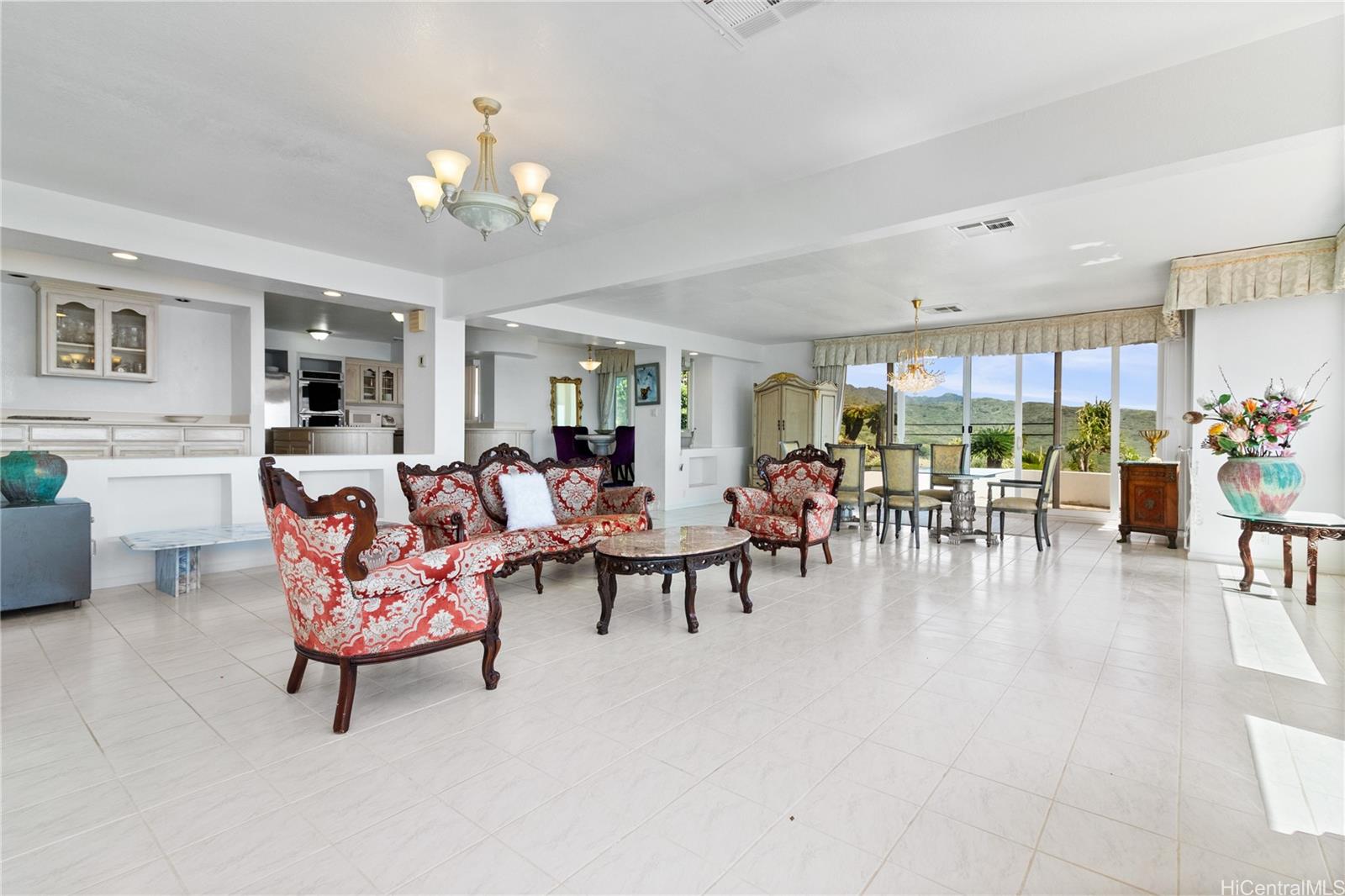 483 Maono Loop Honolulu, HI 96821 - Photo 6 of 25 a living room with furniture and a large window