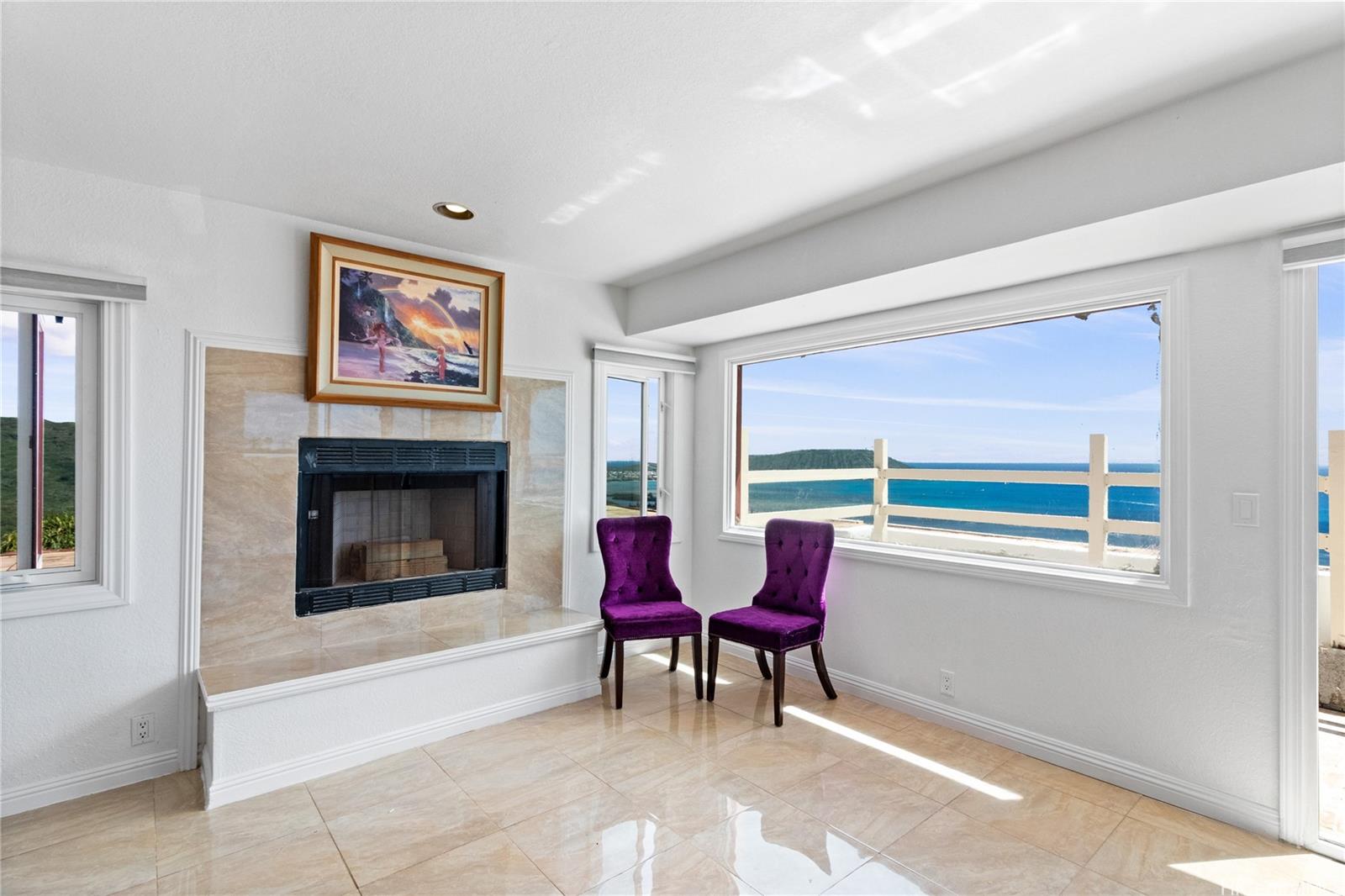483 Maono Loop Honolulu, HI 96821 - Photo 10 of 25 a living room with furniture and a fireplace