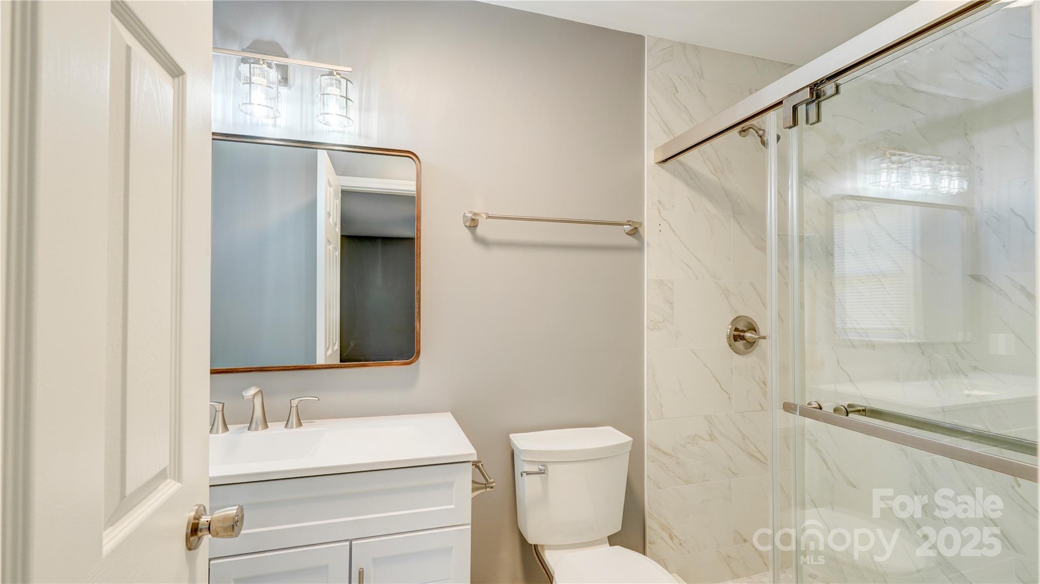 460 Chalk Maple Road China Grove, NC 28023 - Photo 15 of 33 a bathroom with a sink a toilet and shower