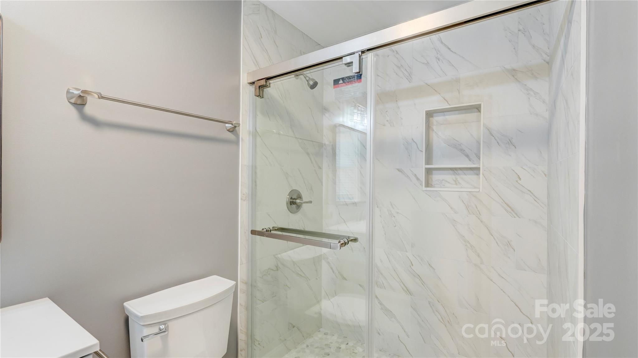 460 Chalk Maple Road China Grove, NC 28023 - Photo 16 of 33 a bathroom with a shower and a toilet