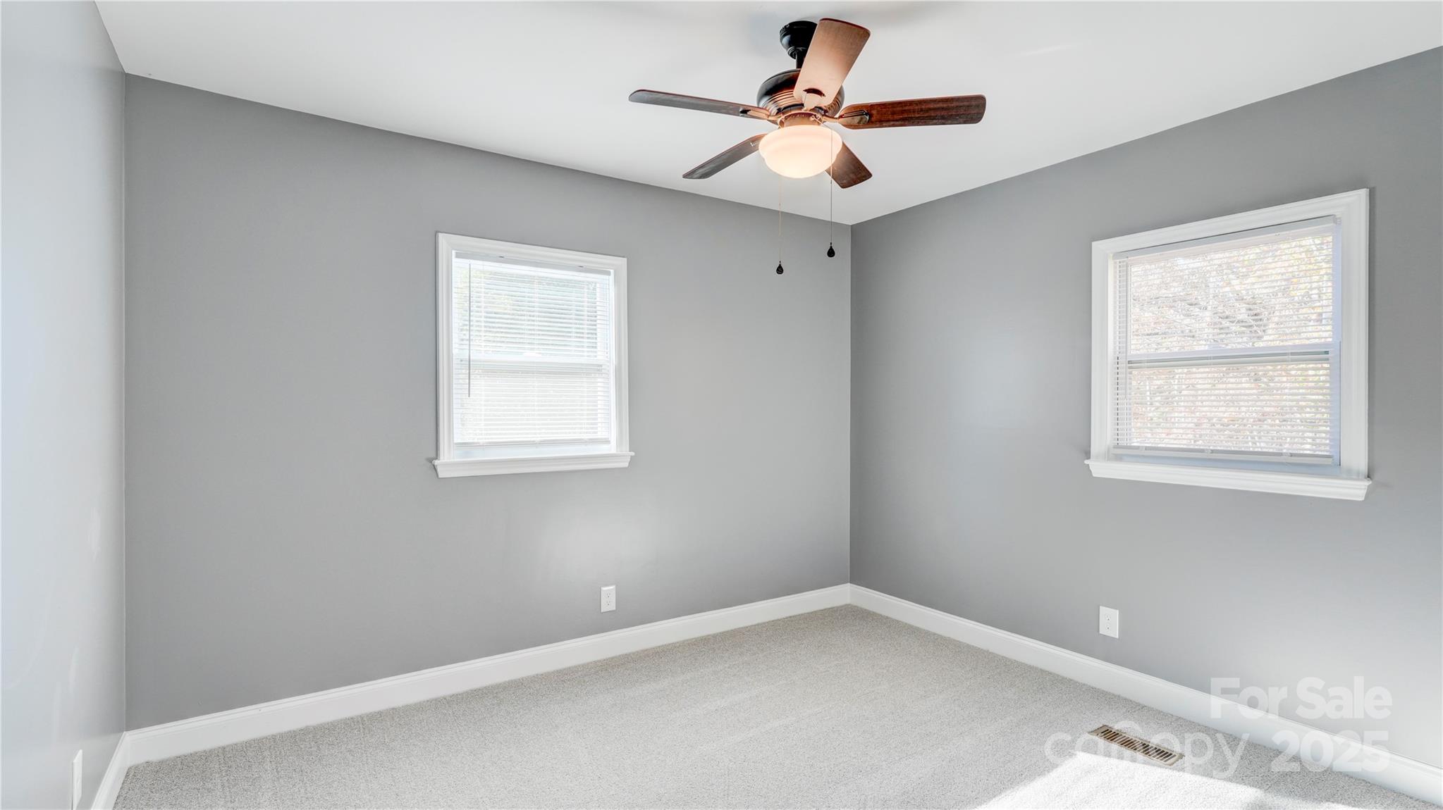 460 Chalk Maple Road China Grove, NC 28023 - Photo 20 of 33 an empty room with a window and a fan