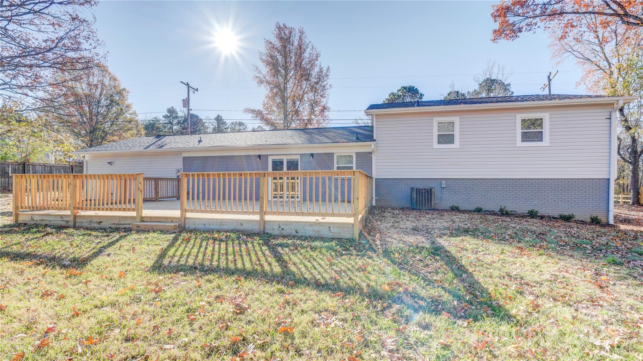 460 Chalk Maple Road China Grove, NC 28023 - Photo 2 of 33 a view of a house with a wooden fence
