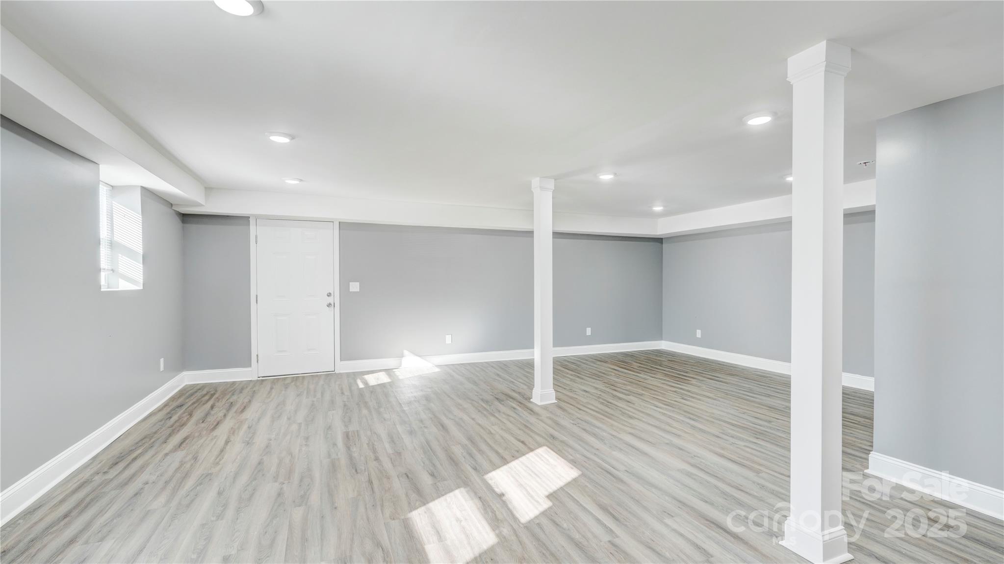 460 Chalk Maple Road China Grove, NC 28023 - Photo 22 of 33 a view of an empty room with wooden floor