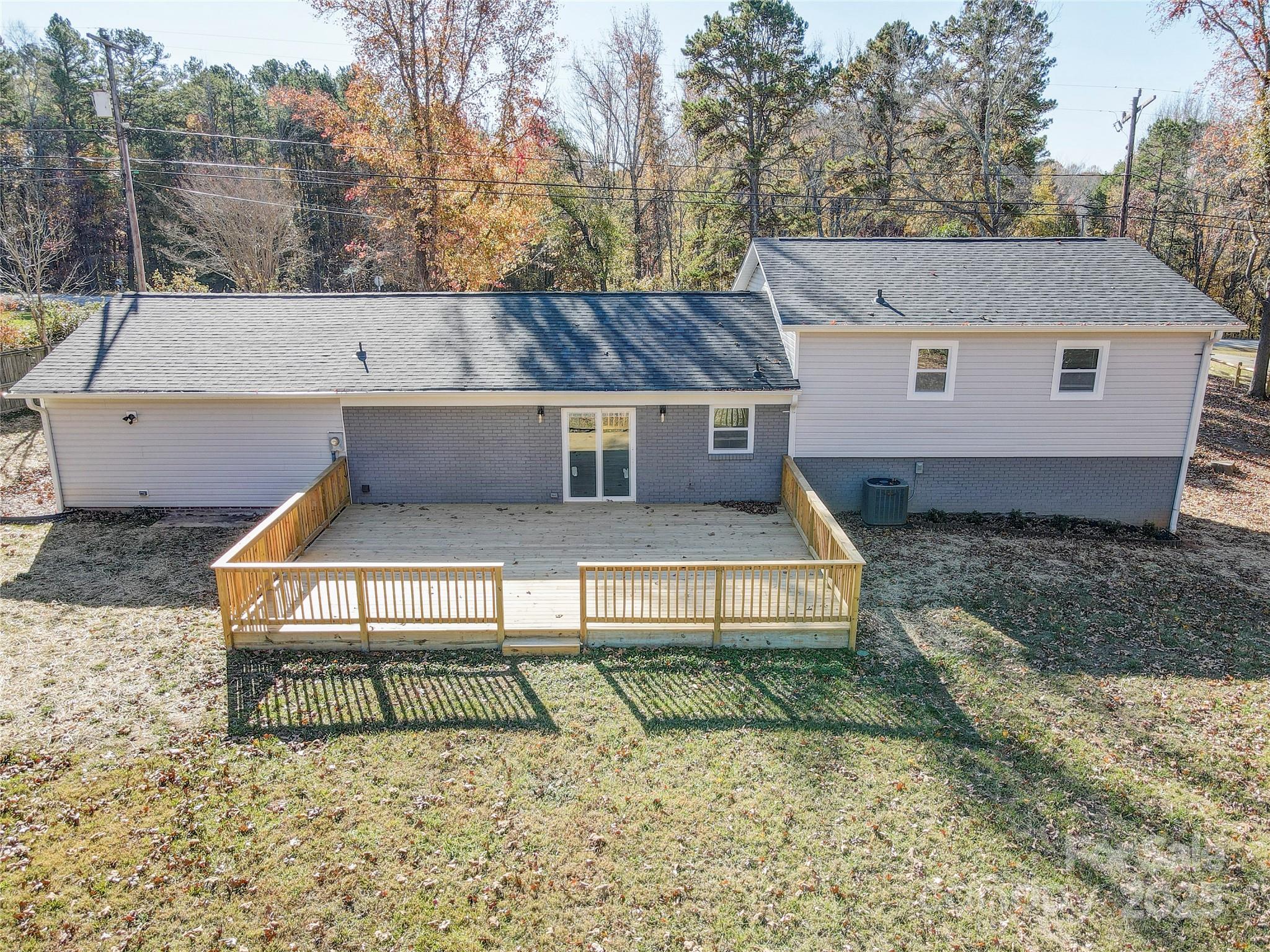 460 Chalk Maple Road China Grove, NC 28023 - Photo 28 of 33 a view of a house with a yard and sitting area