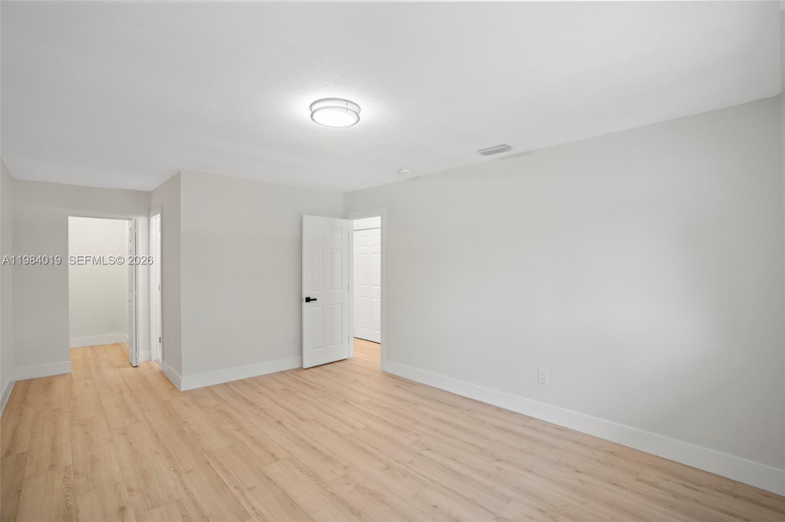 28015 Southwest 143rd Court Homestead, FL 33033 - Photo 21 of 29 a view of an empty room