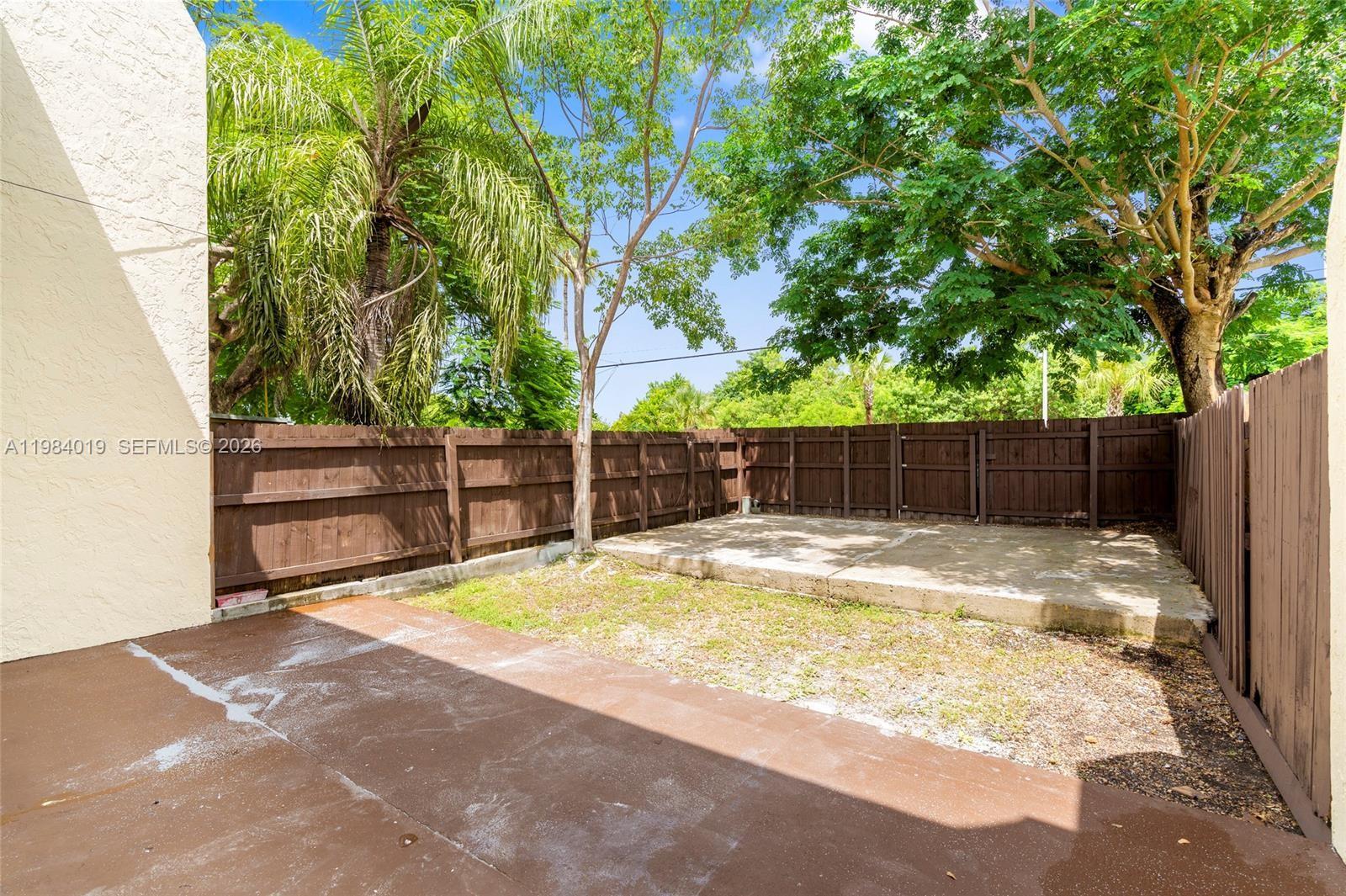 28015 Southwest 143rd Court Homestead, FL 33033 - Photo 26 of 29 a view of small space with wooden fence