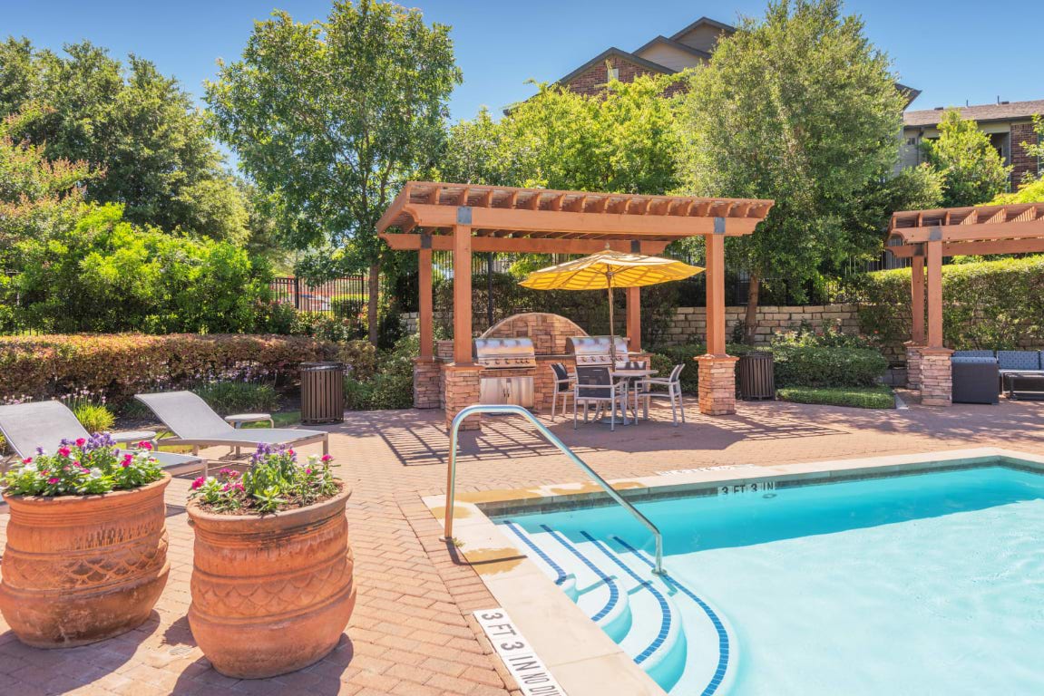 12101 Dessau Road, Unit 1703 Austin, TX 78754 - Photo 12 of 20 a view of a backyard with plants and a patio