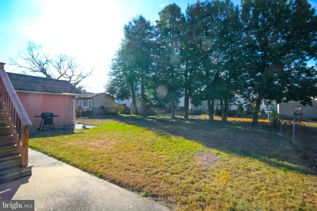 a view of swimming pool with trees