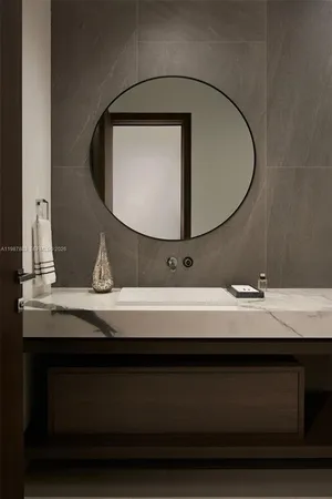 a view of a bedroom with wooden floor and closet