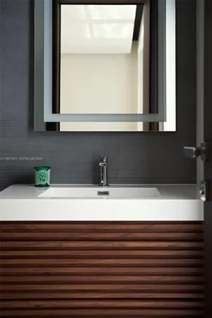 a view of a car park in front of house