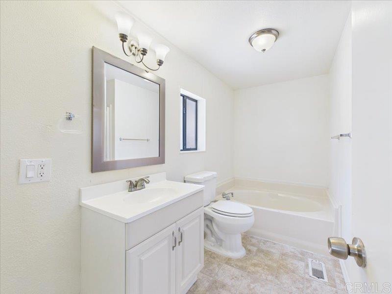 37589 Montezuma Valley Road Ranchita, CA 92066 - Photo 28 of 43 a bathroom with a toilet sink and mirror