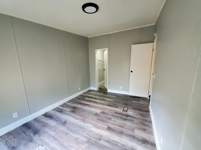 a view of a livingroom with a wooden floor